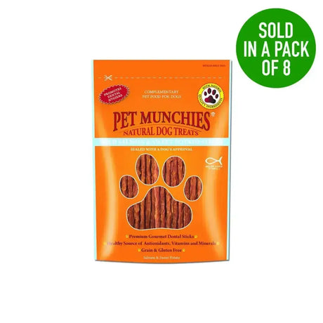 Orange pouch of pet munchies wild salmon natural dog treats with paw print window showing sweet potato sticks