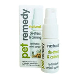 White plastic pet remedy calming spray bottle with green and yellow label featuring valerian essential oil spray nozzle