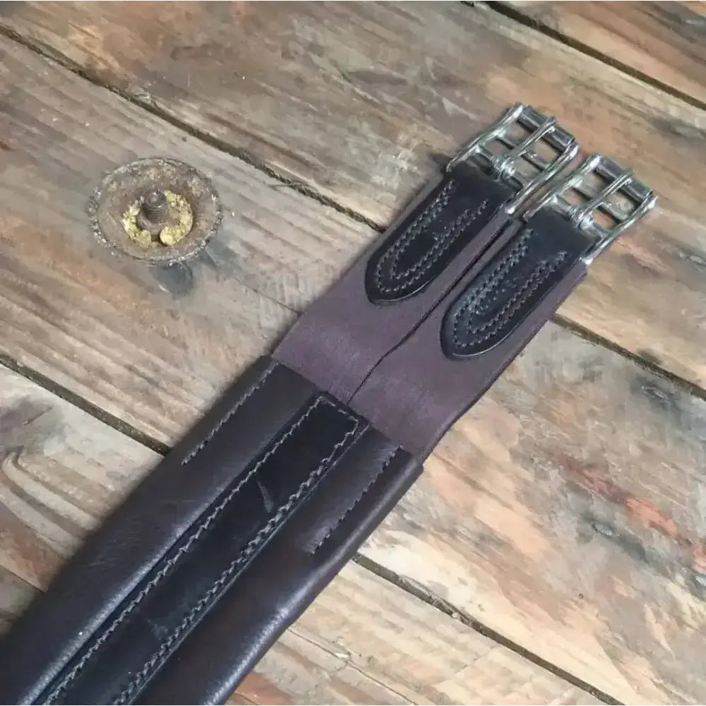 Black leather plain atherston elasticated leather girth with silver stainless steel buckles and stitched detailing
