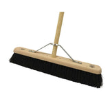 A medium platform broom fitted with a sturdy wooden handle and black bristles secured by metal brackets