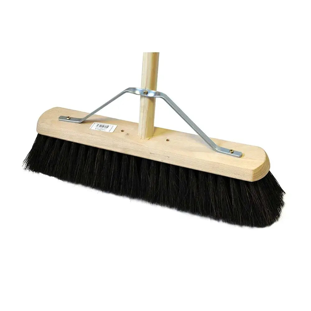 Platform broom fitted with black bristle, light wood handle, and metal bracket for finest medium cleaning tasks