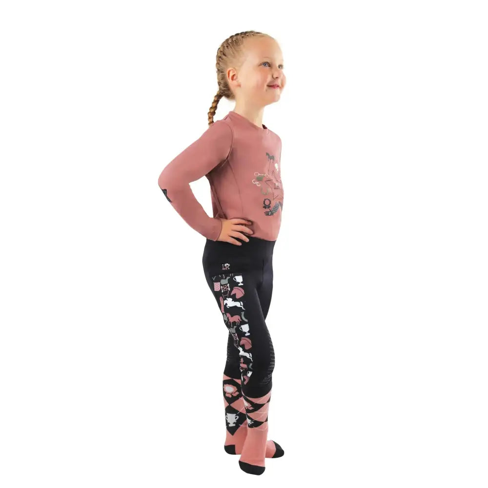 Pink and black patterned leggings with pony passion motif featuring horse and cow designs for a blush long sleeved look