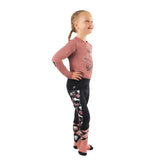 Pink and black patterned leggings with pony passion motif featuring horse and cow designs for a blush long sleeved look