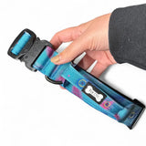 A vibrant turquoise and purple peacock power dog collar with black buckle from pup chic strong large tactical dog collars