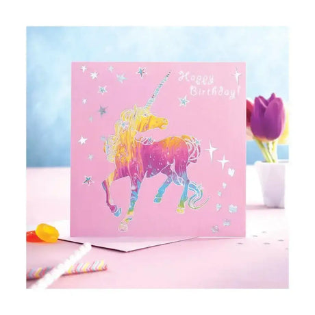 A vibrant pink unicorn birthday card featuring a prancing unicorn with a silver horn and glittering stars perfect for celebrations