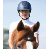 Dark blue premier equine odyssey horse riding helmet with textured front panel and black chin strap for safety