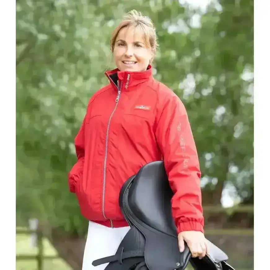 Red waterproof riding jacket with silver zipper and subtle logo from premier equine pro rider unisex collection