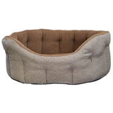 Cozy tufted dog bed with gray orkney tweed fleece exterior and plush brown sherpa fleece lining in lined bolster beds style