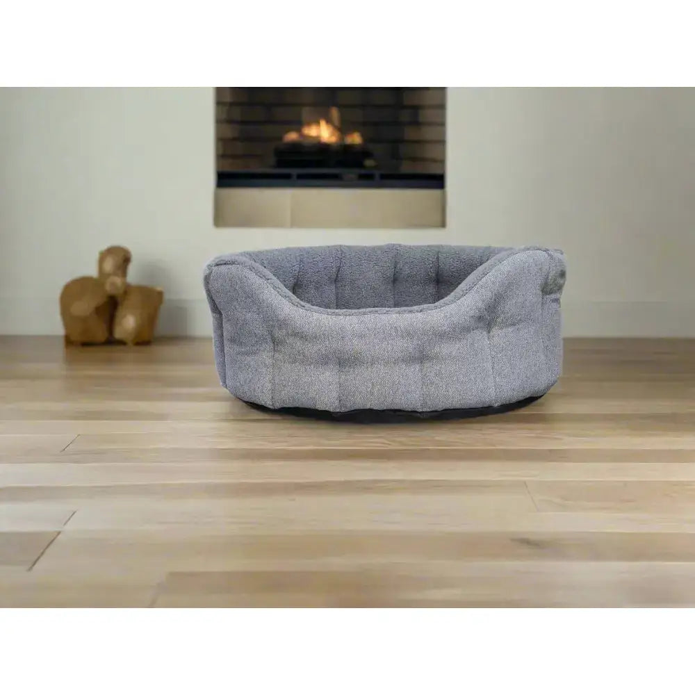 Gray tufted lined bolster bed with sherpa fleece lining and black base from premium orkney tweed fleece collection