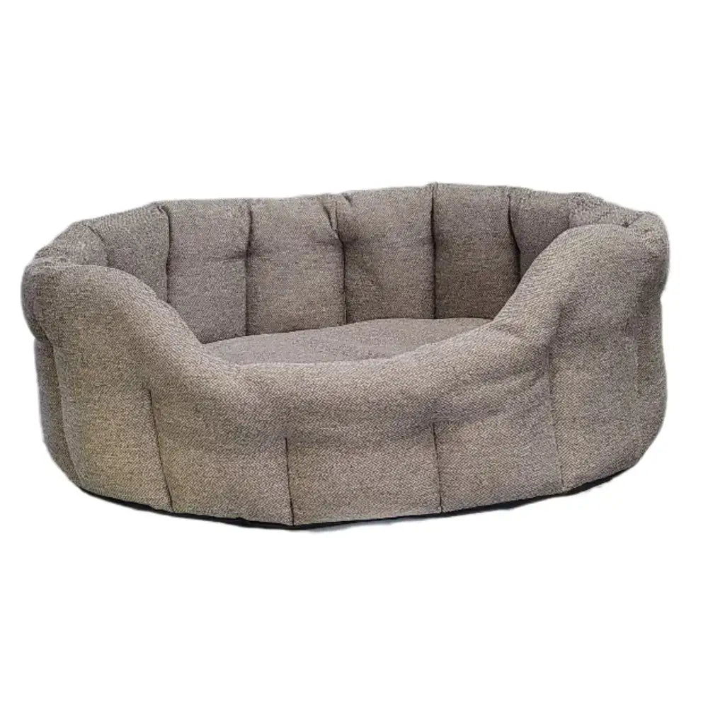 A cozy premium orkney tweed oval bed in textured gray fabric with tufted sides and a 7cm base