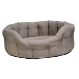 A cozy premium orkney tweed oval bed in textured gray fabric with tufted sides and a 7cm base