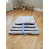 Stacked gray plush premium orkney tweed rectangular country dog beds with textured fabric and blue brand tags by p&l