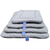 Stacked premium orkney tweed rectangular gray herringbone pet beds with blue branded tags by p&l country dog beds