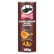 A pringles tube snacks can of flame grilled steak flavour crisps with a dark brown label and steak illustration