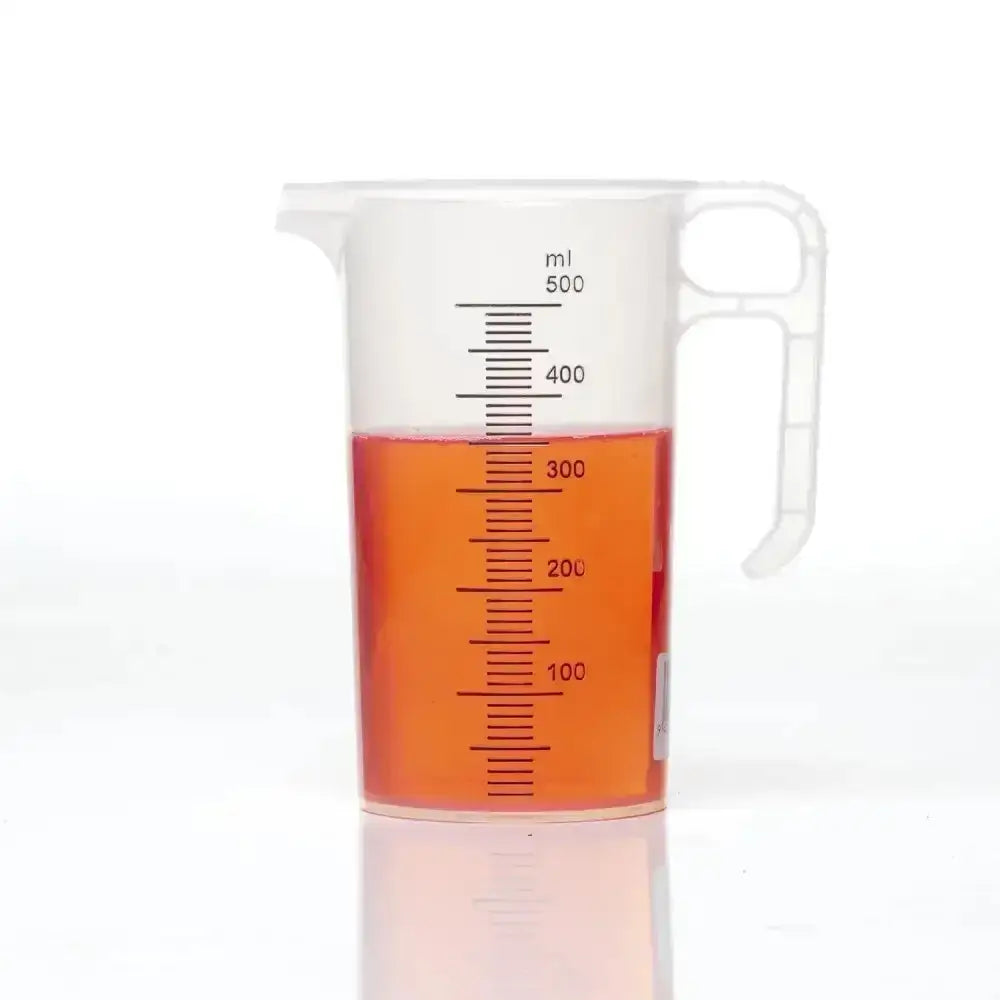 Clear plastic pro-measures pro-jug measuring cup with handle and 500ml markings filled with orange liquid for everyday commercial durability