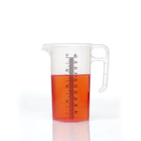 Transparent plastic pro-measures pro-jug with white handle and red liquid designed for everyday commercial durability