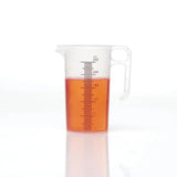 Transparent plastic pro-measures pro-jug with white handle and black ml markings filled halfway with orange liquid designed for everyday commercial durability