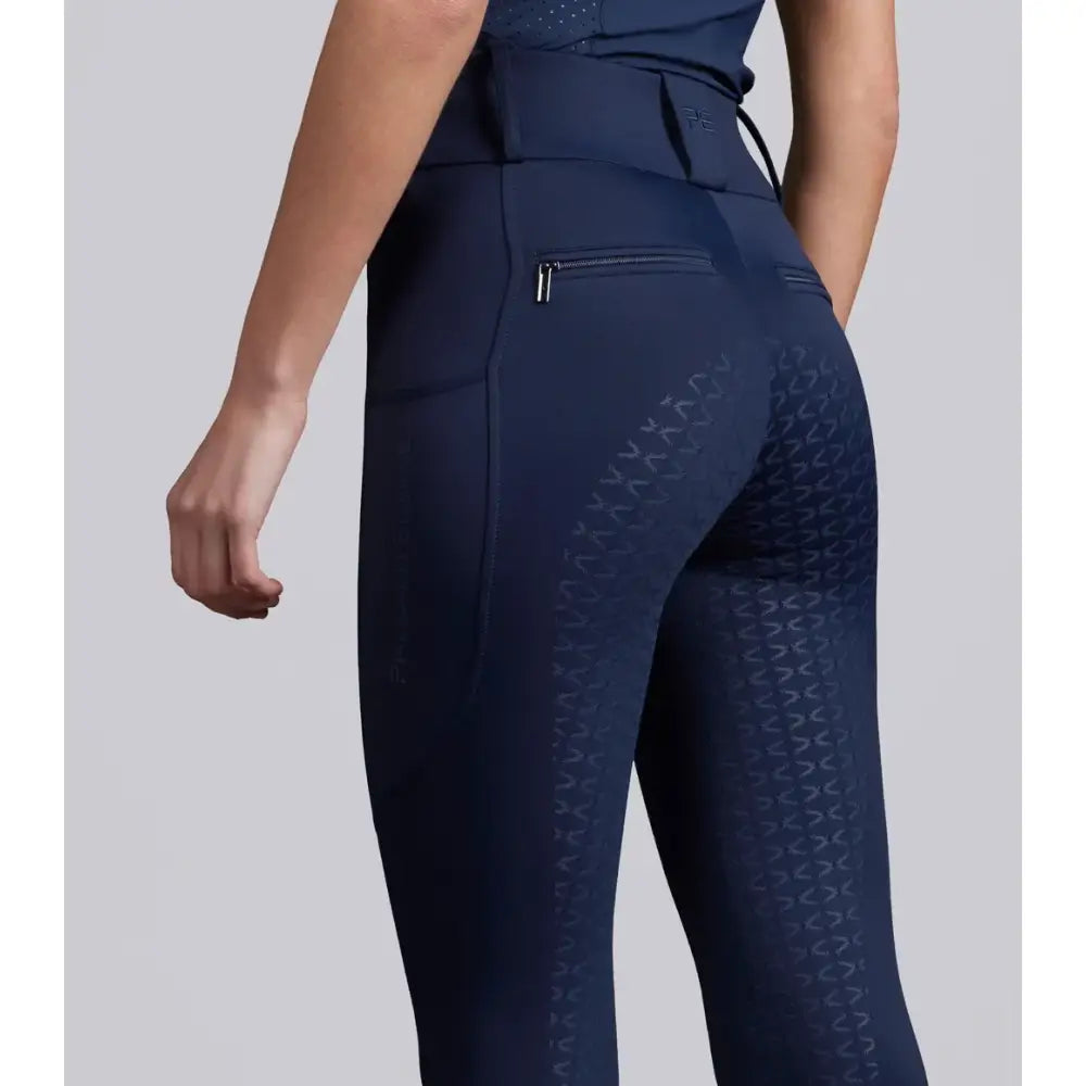 Navy blue prospero riding tights with subtle textured thigh pattern designed for performance riding