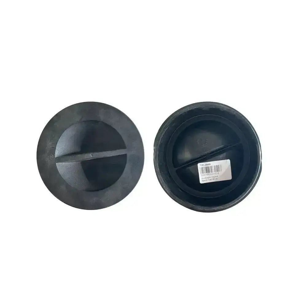 Black plastic prostable hayball spare cap with central ridge and circular shape for hayball spare replacements