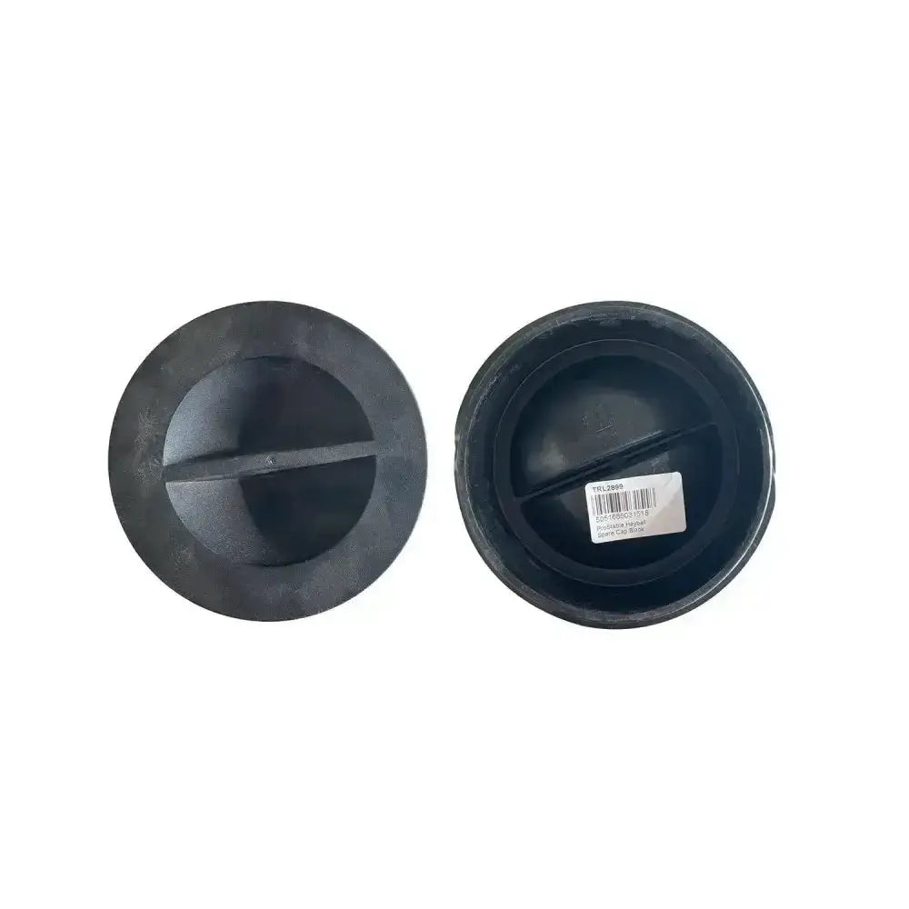 Black plastic prostable hayball spare cap with textured surface and central ridge for secure hayball sealing
