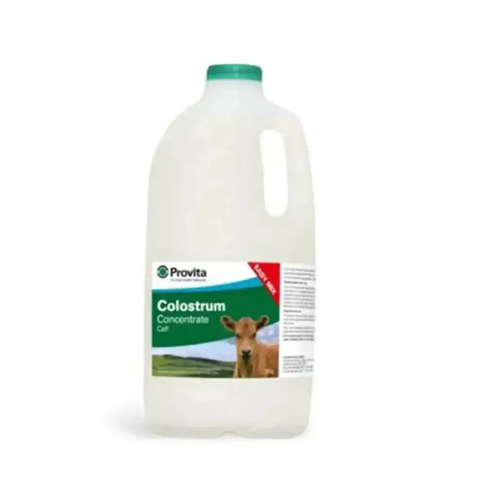 A white plastic jug with a green cap and label of provita calf colostrum natural eu sourced nutritional energy source