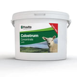 White plastic bucket of provita lamb colostrum concentrate with green label featuring lamb image for newborn lambs