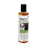A 250ml bottle of pureflax linseed oil for dogs with natural cold pressed amber liquid in clear plastic container with black cap