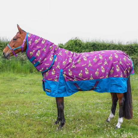Purple and blue horse rug with a repeating pattern of cartoonish horses in gold and white, featuring the brand name ’storm’ on its side.