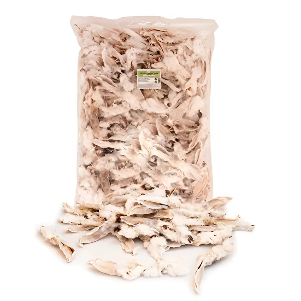 A clear plastic bag of pale pink and white rabbit ears fur 2kg pieces for equestrian use spilling out below