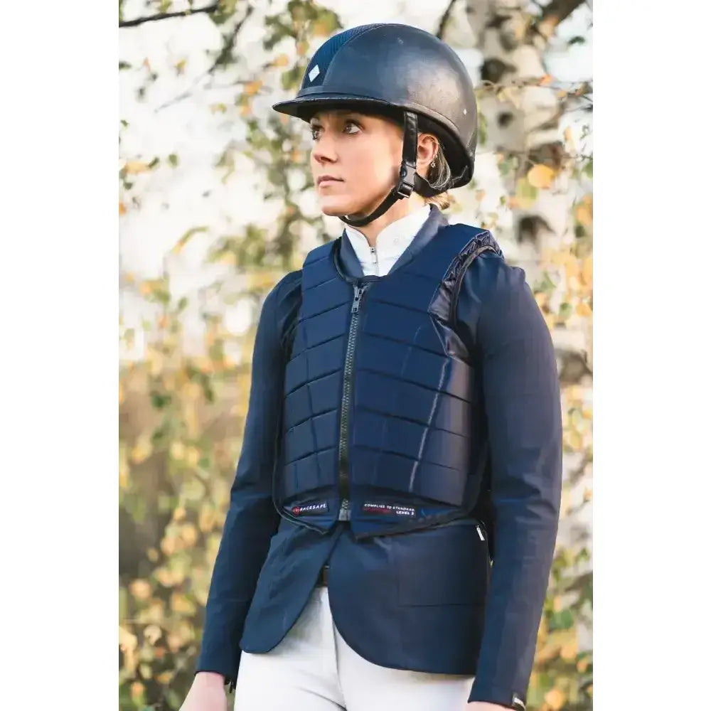 Navy blue quilted racesafe rs2010 adults body protector with black zipper and adjustable straps for safe riding