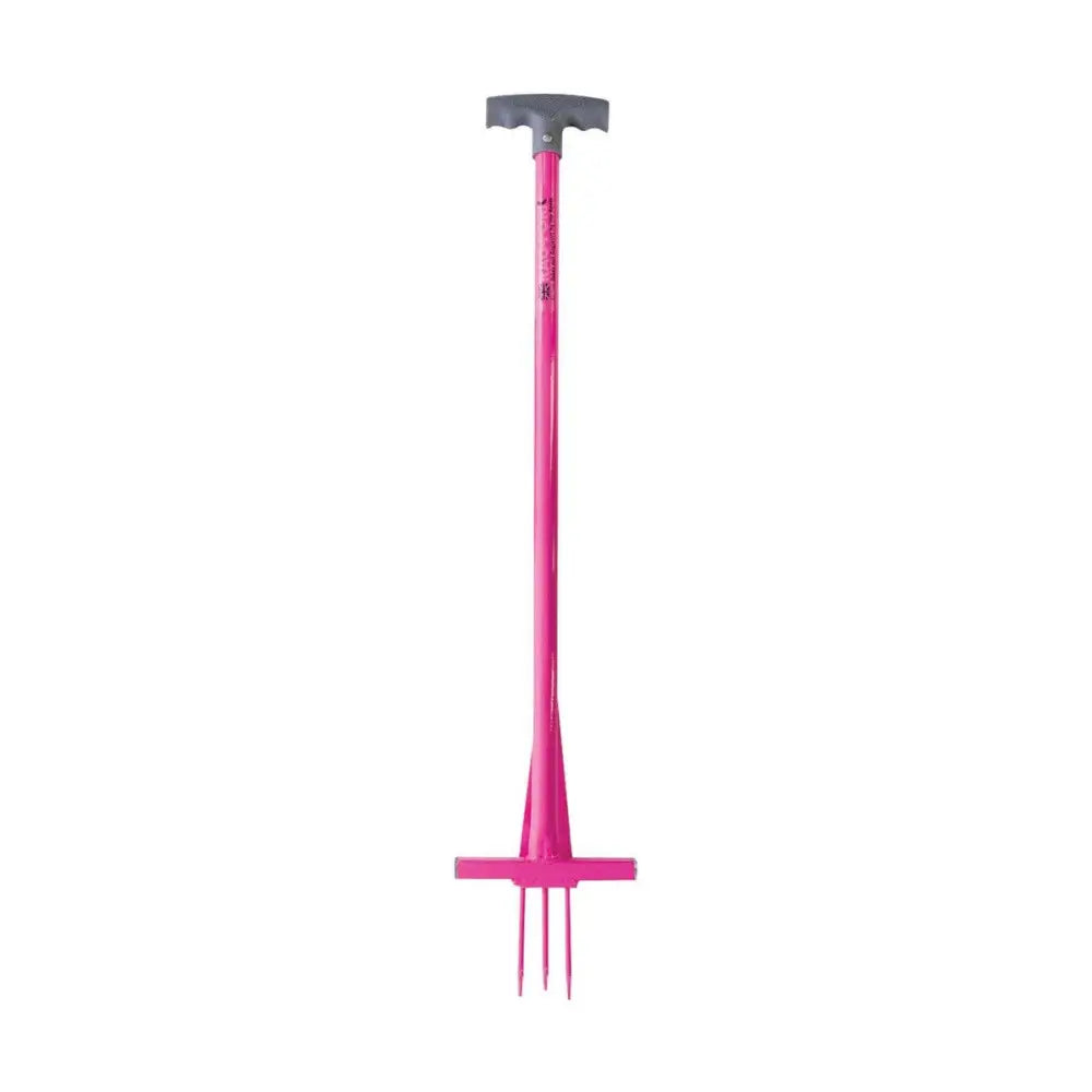 Rag-fork bright pink metal gardening fork with gray t-shaped handle and three prongs to remove ragwort fast