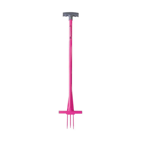 Rag-fork bright pink metal gardening fork with gray t-shaped handle and three prongs to remove ragwort fast
