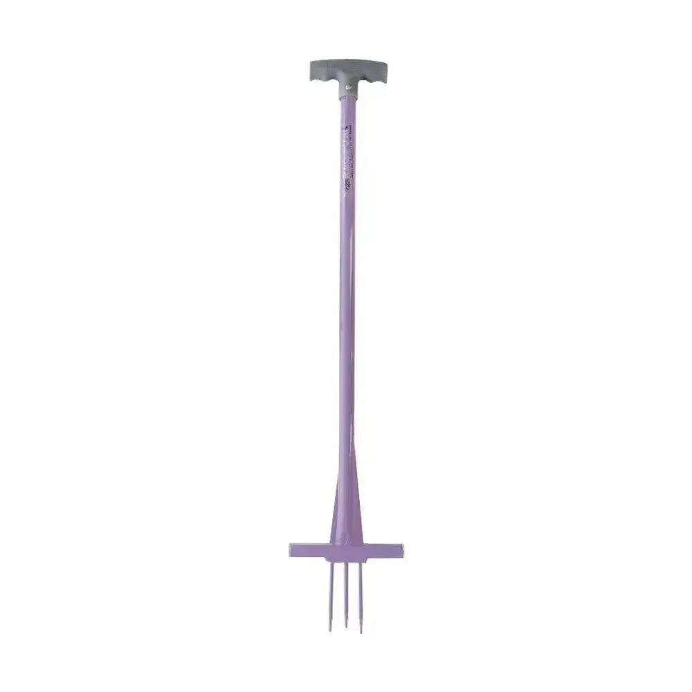 Purple rag-fork gardening fork with gray t-shaped handle and three metal tines to remove ragwort and paddock weeds quickly