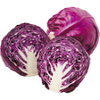 Two vibrant purple red cabbage halves showing layered leaves and a crisp white core perfect for equestrian meals