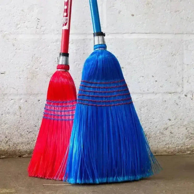 Two red gorilla deluxe brooms with vibrant red and blue bristles, plastic handles, and metal connectors for easy clean sweeps