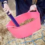 Pink plastic hay scoop with purple handle for easy grip shown with red gorilla flexible shallow bucket 15l small