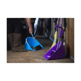 Purple plastic broom holder with attached yellow straw brooms and handles in red gorilla teenie tidee design