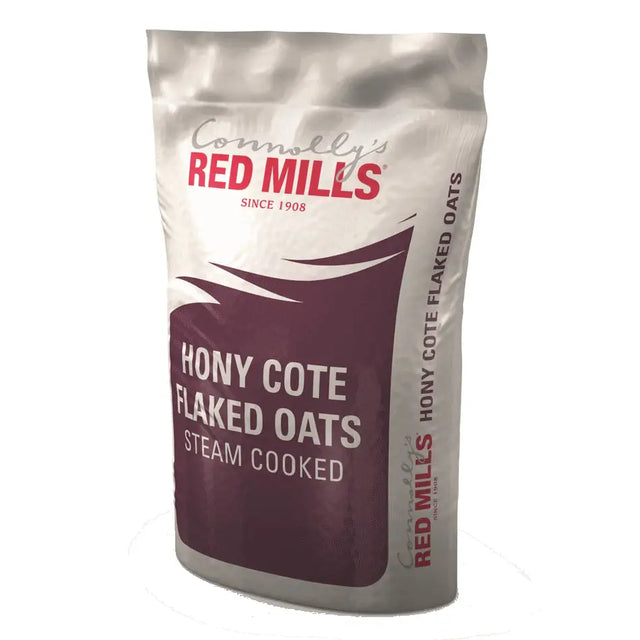 A white and maroon pouch of red mills hony cote flaked oats steam cooked for natural souroyal canine use 20 kg
