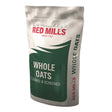 A white and green resealable bag of conway’s red mills whole oats 25 kg cleaned and screened for equestrian horses