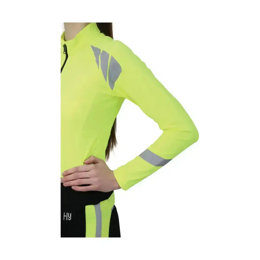 Bright neon yellow reflector base layer jacket by hy equestrian with reflective gray stripes on shoulder and sleeve