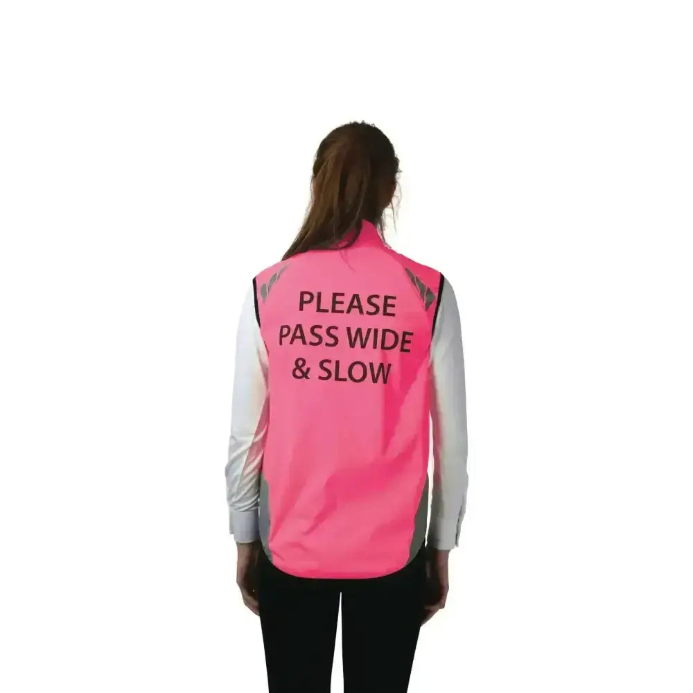 A bright pink reflector gilet by hy equestrian with black pass wide slow text and handy zip pocket on the back