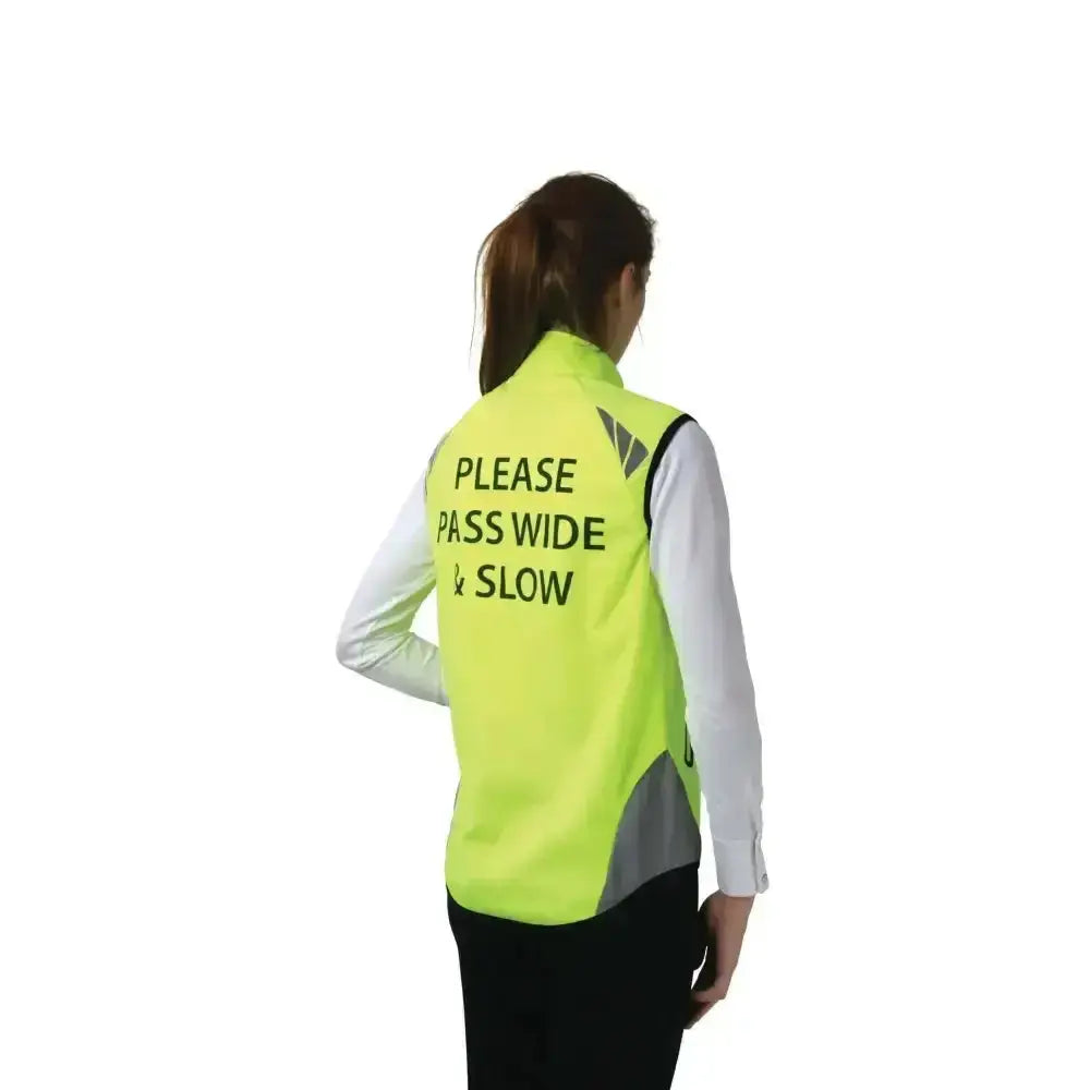 Back view of bright yellow reflector gilet by hy equestrian with please pass wide and slow text and reflective panels