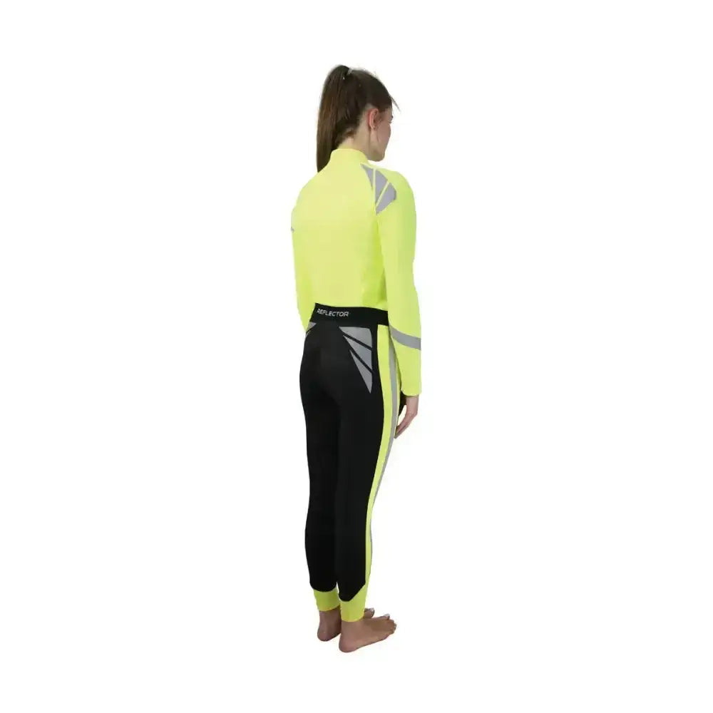 Neon yellow and black reflector riding tights by hy equestrian with reflective gray panels for eye-catching reflector riding
