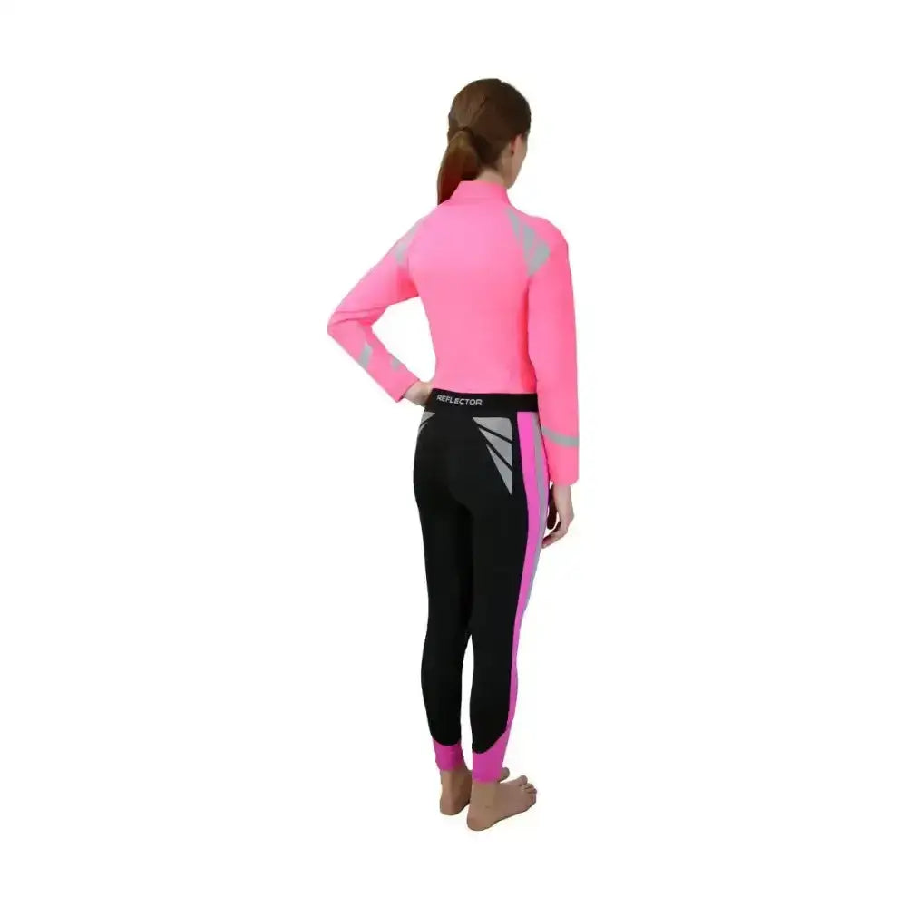 A vibrant pink and black long-sleeved reflector riding tights with reflective gray panels by hy equestrian