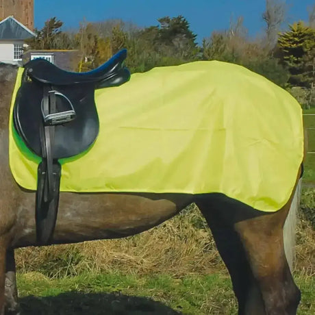 Bright yellow rhinegold 3/4 ride on rug with soft fleece, waterproof saddle blanket, black stirrups, and saddle