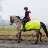 Bright neon yellow waterproof ride on rug by rhinegold with soft fleece perfect as exercise sheets for horses