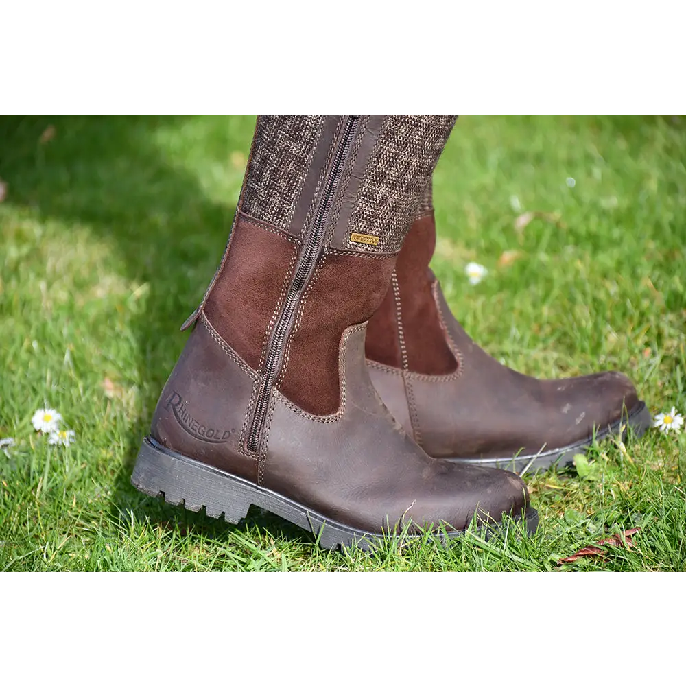 Brown leather Rhinegold Albany Tweed Country Boot with patterned upper on grass