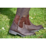 Brown leather Rhinegold Albany Tweed Country Boot with patterned upper on grass