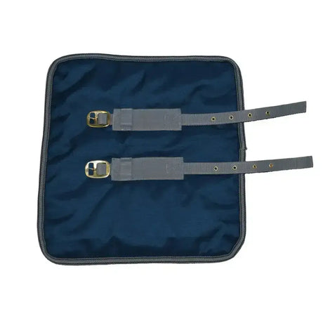 Dark blue padded roll-up carrying case with gray straps and brass buckles for rhinegold chest expander or horse rug chest