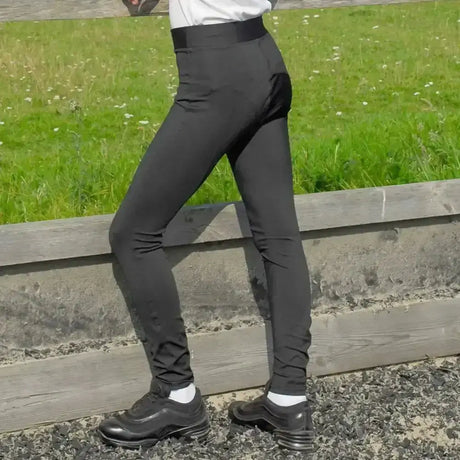 Black high-waisted rhinegold childrens everyday riding tights shown from the back with smooth fabric and reinforced stitching
